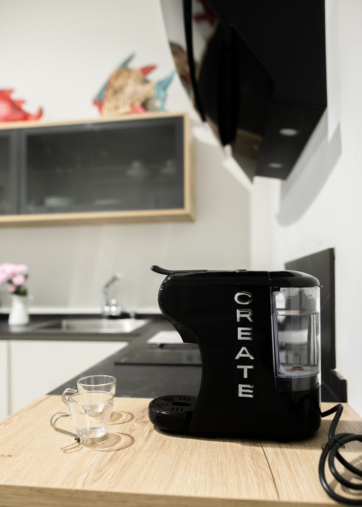 Cafetera de cápsulas Cafetera de cápsulas disponible en la cocina totalmente equipada de Casa Señorial Rivadavia